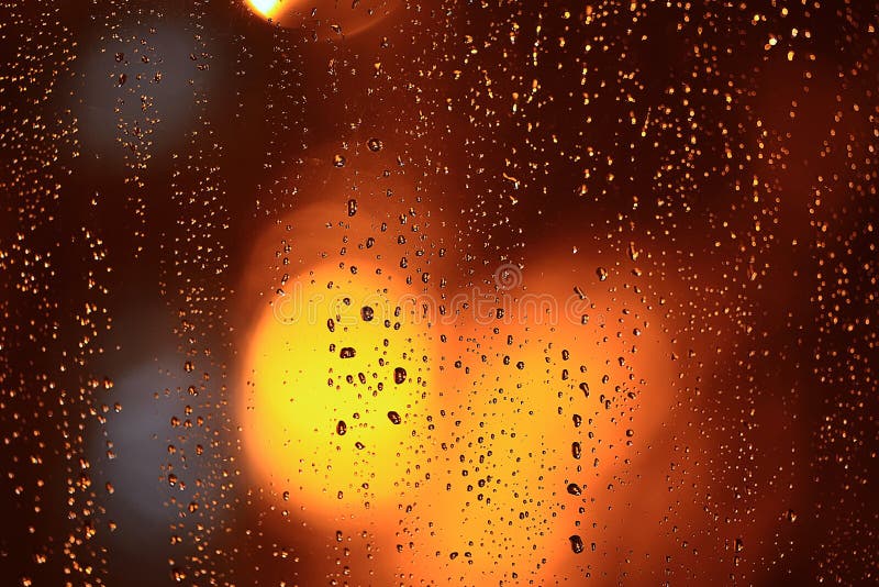 Abstract texture wet window with glare bokeh. Abstract texture wet window with glare bokeh