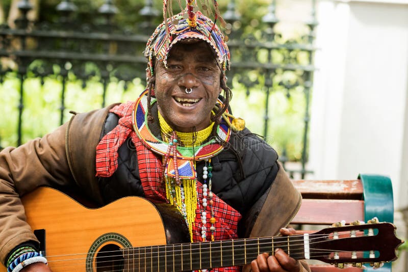 Street artist man playing guitar and singing. Cape Town, South Africa. Street artist man playing guitar and singing. Cape Town, South Africa