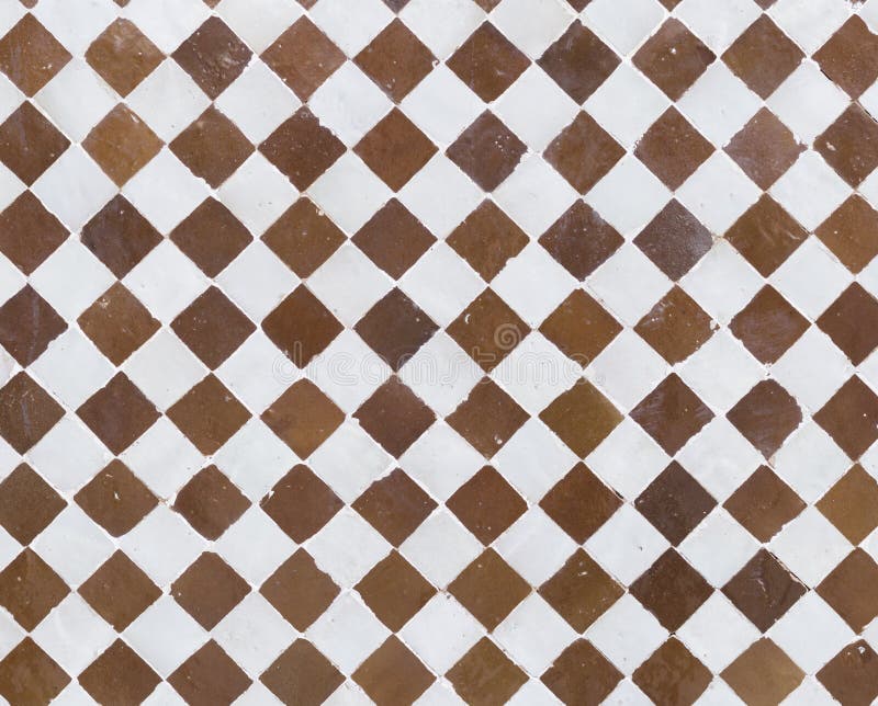 A checkerboard tile pattern of old tiles. A checkerboard tile pattern of old tiles