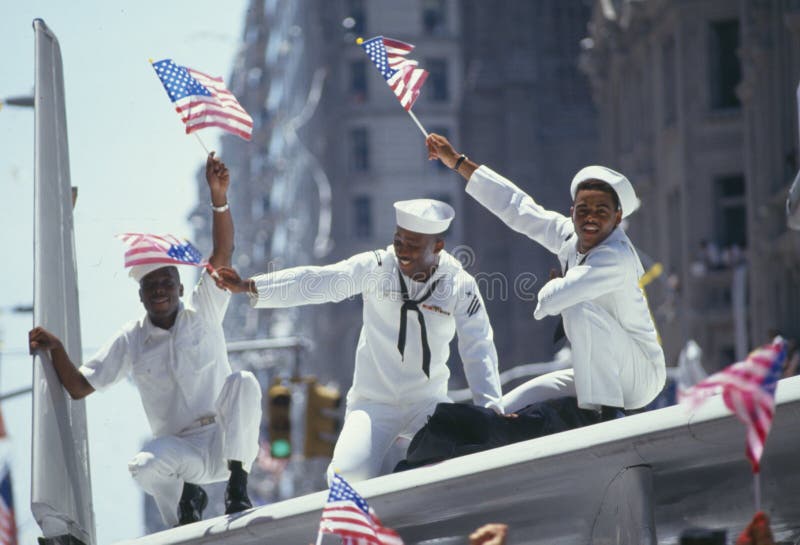 Three African-American Sailors Celebrating Desert Storm Victory Parade, New York City, New York. Three African-American Sailors Celebrating Desert Storm Victory Parade, New York City, New York