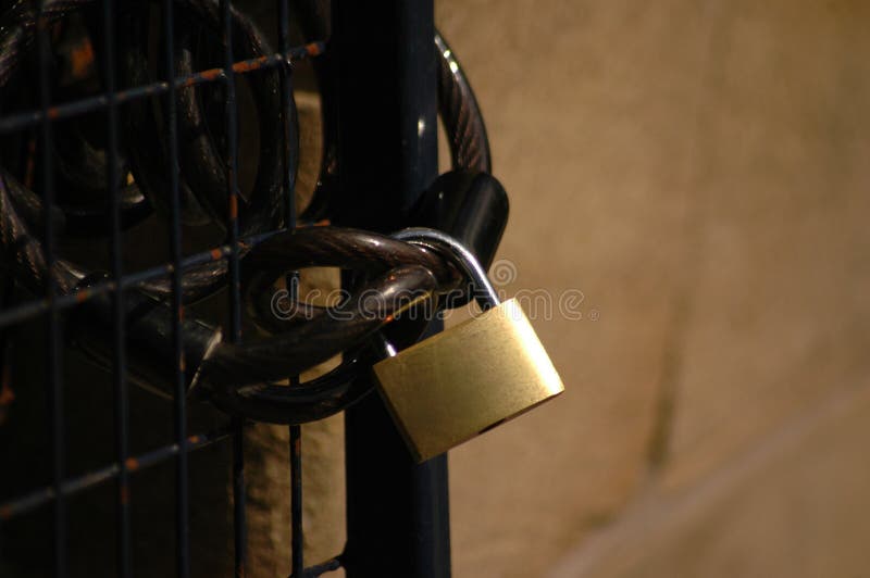 A padlock providing security to property. A padlock providing security to property.