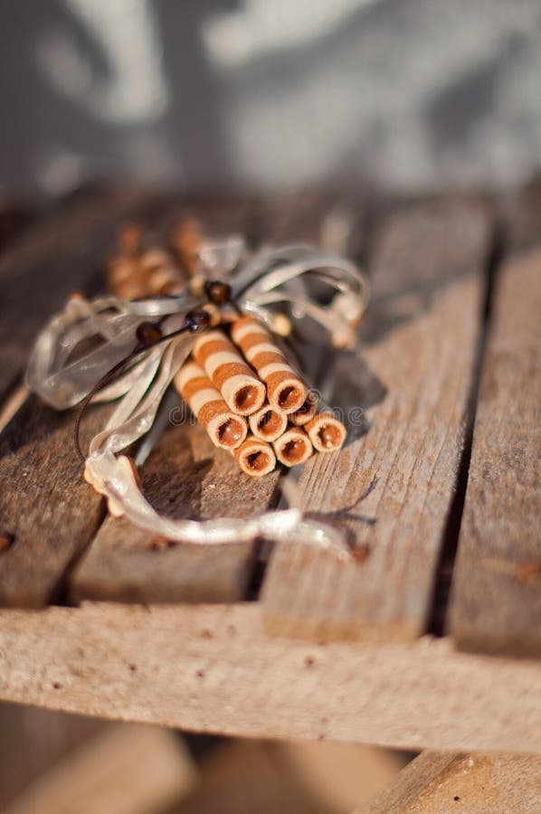 Wafer rolls on a wooden board