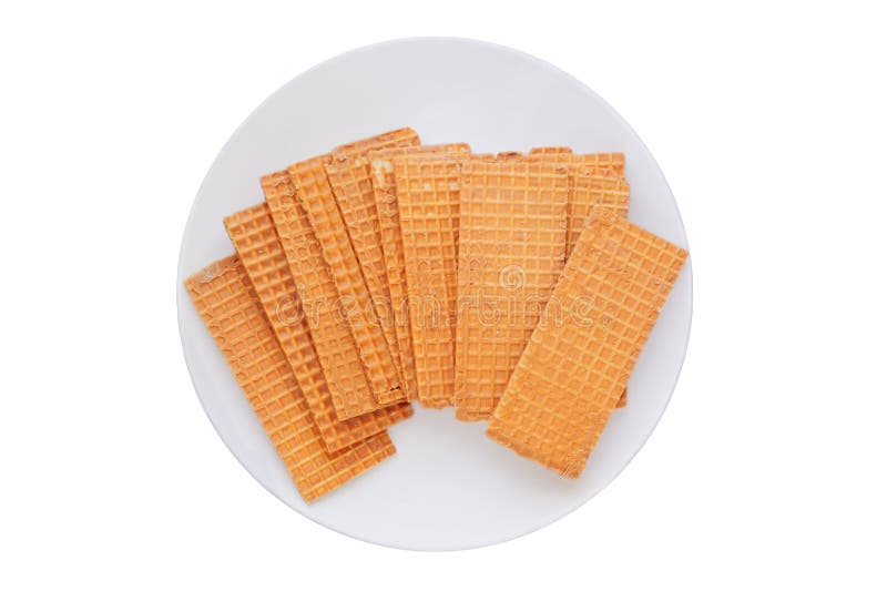 Waffles with chocolate coating. Group of waffles in ceramic plate. Belgian dessert. Isolate on a white background. Top view. stock photo