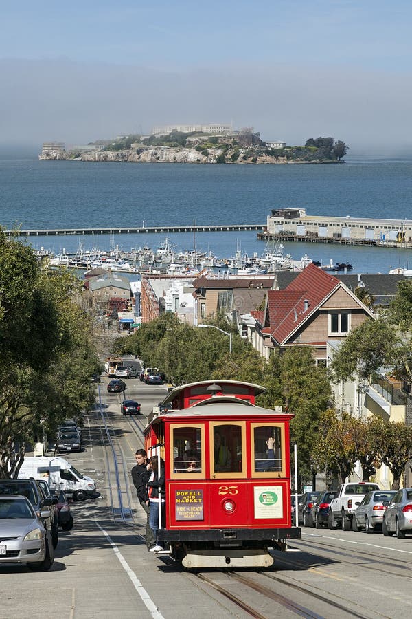 A View of Cable Car and Alcatraz Island, both are the icons at the Bay Area in San Francisco, California. A View of Cable Car and Alcatraz Island, both are the icons at the Bay Area in San Francisco, California.