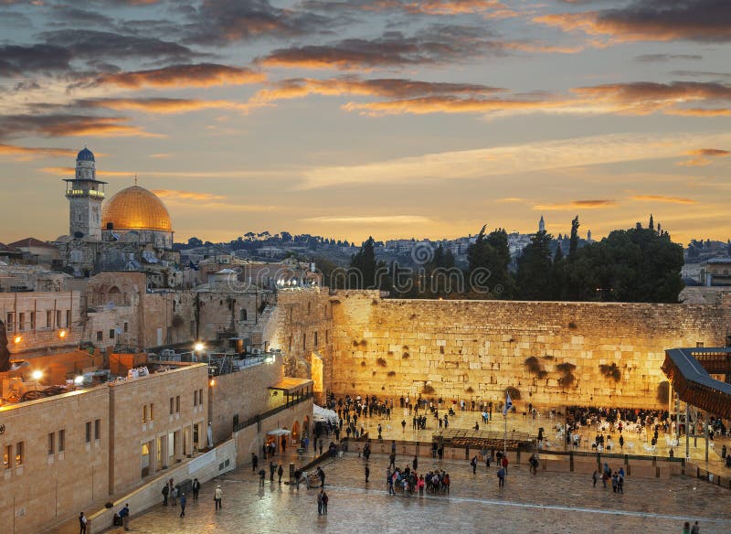 The wailing Wall and the Dome of the Rock in the Old city of Jerusalem at sunse