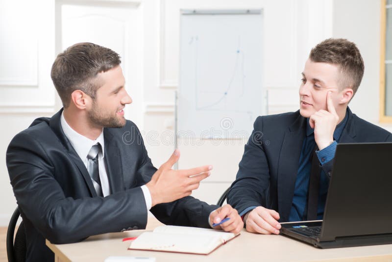 Waist-up portrait of two handsome businessmen in stock photos Waist-up portrait of two handsome businessmen in stock photos