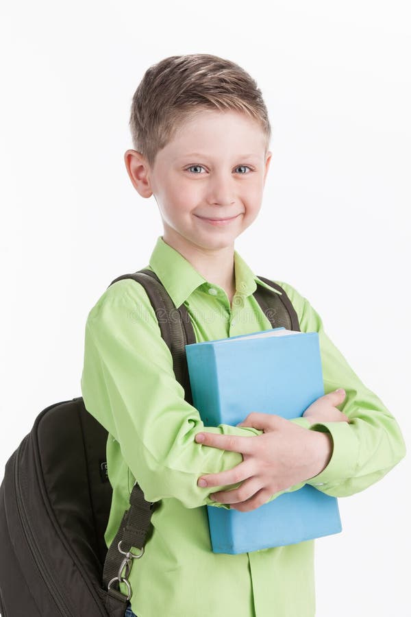 Waist up of schoolboy with backpack, on white background. royalty free stock images
