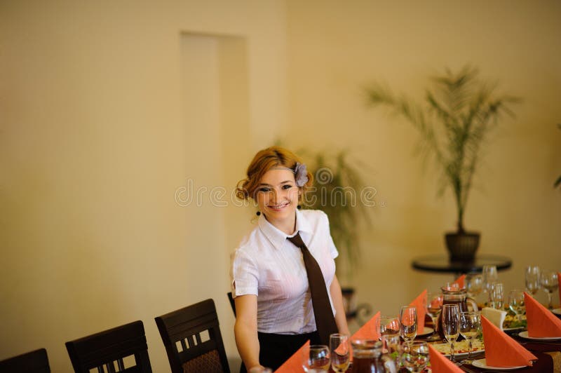 Waiter Near the Table with Food Stock Image Image of clothing, glass