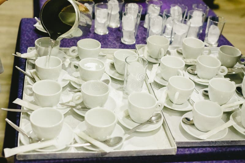Waiter Serving Coffee during an Event in Cups Stock Photo Image of