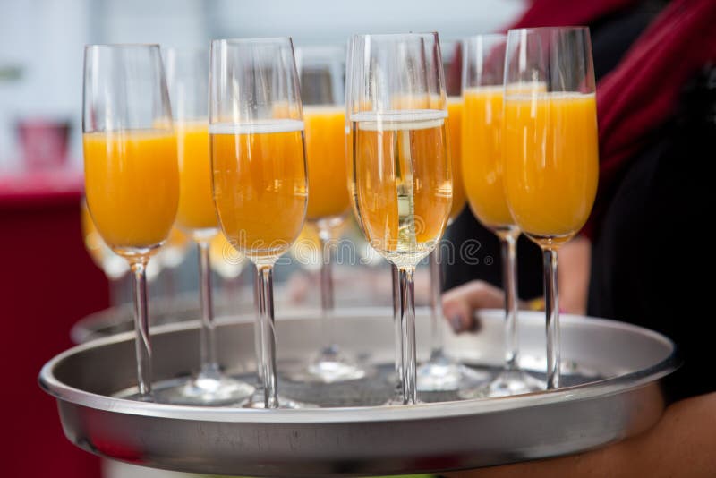 Waiter Serving Champagne and Orange Juice Stock Photo Image of