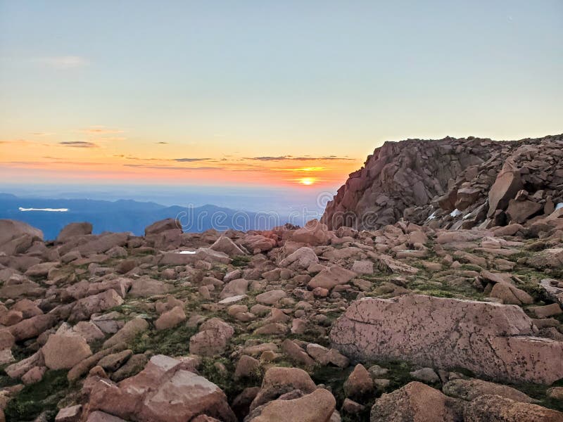 Waiting for sun rise on pikes peak stock image