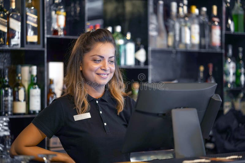 The waitress registrating order by cash register royalty free stock image