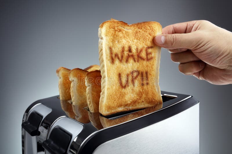 Wake up toasted bread in a toaster royalty free stock image Wake up toasted bread in a toaster royalty free stock image