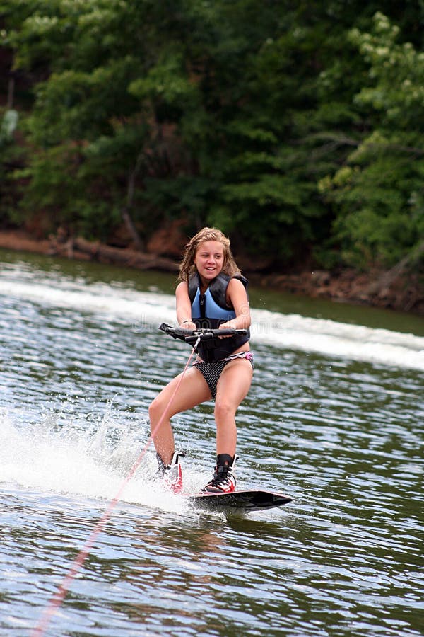 Wakeboarding Girl stock photo. Image of speed, smile 10127082