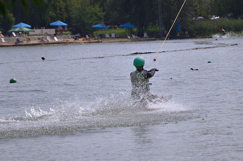 Wakeboarding by the lake editorial photo. Image of lakes 250173626