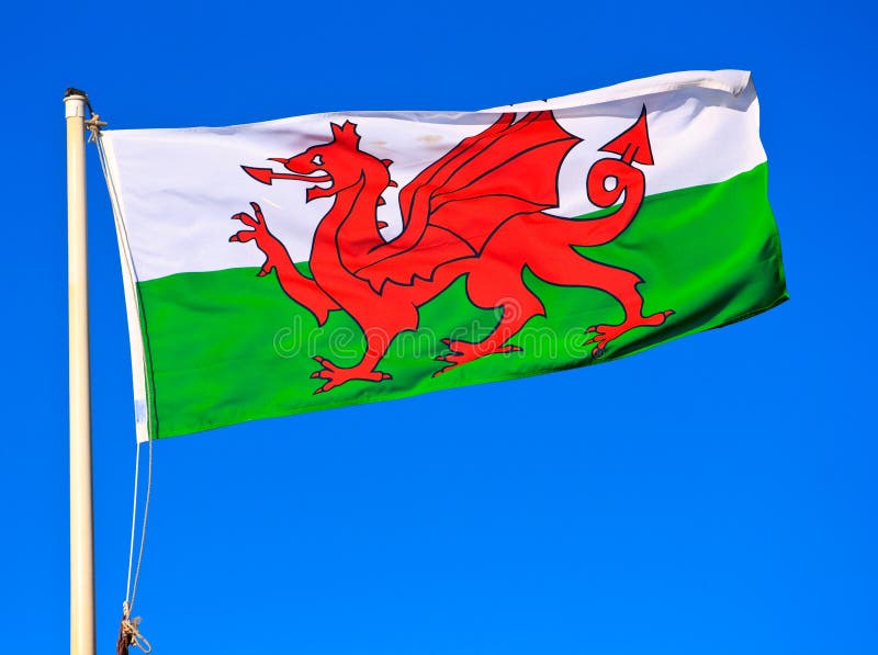 Welsh flag flying showing the red dragon of Wales. Welsh flag flying showing the red dragon of Wales