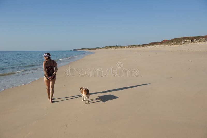 Walk the dog on the beach