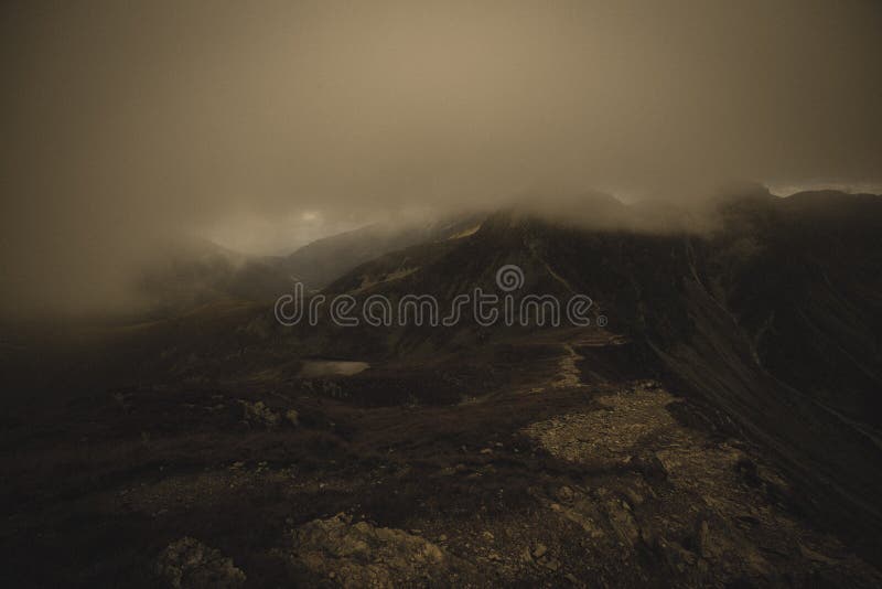 Walking above clouds in slovakian Tatra mountains - vintage retro look