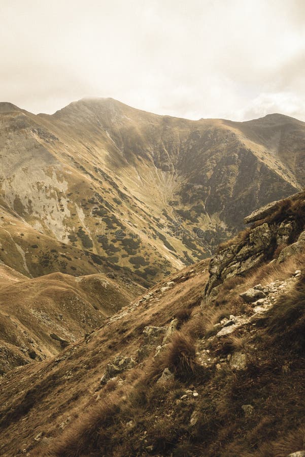 Walking above clouds in slovakian Tatra mountains - vintage retro look