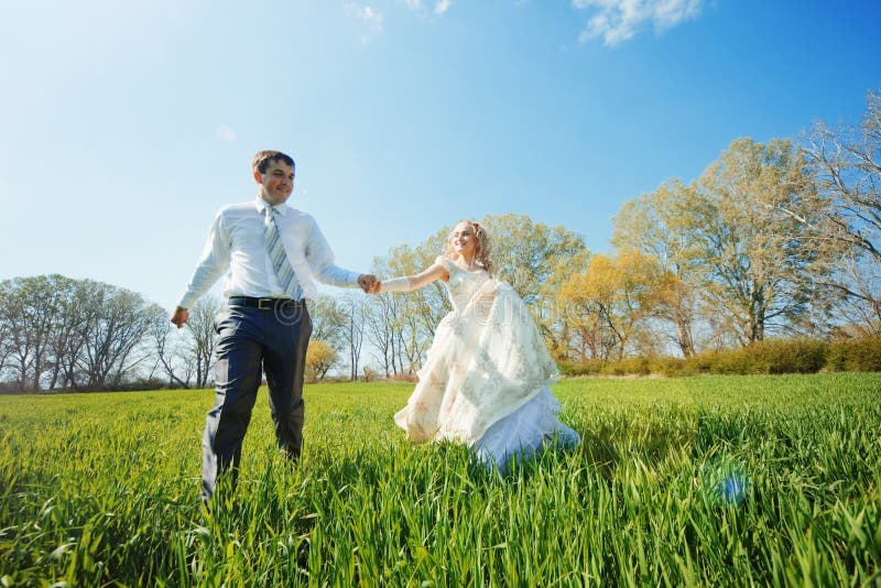 Walking bride and groom stock photo