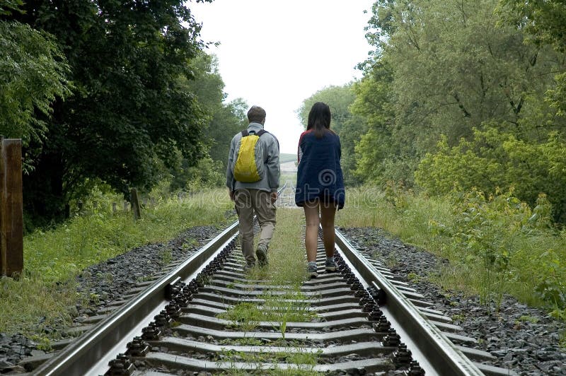Walking down tracks stock photo. Image of road, rail, person 232360
