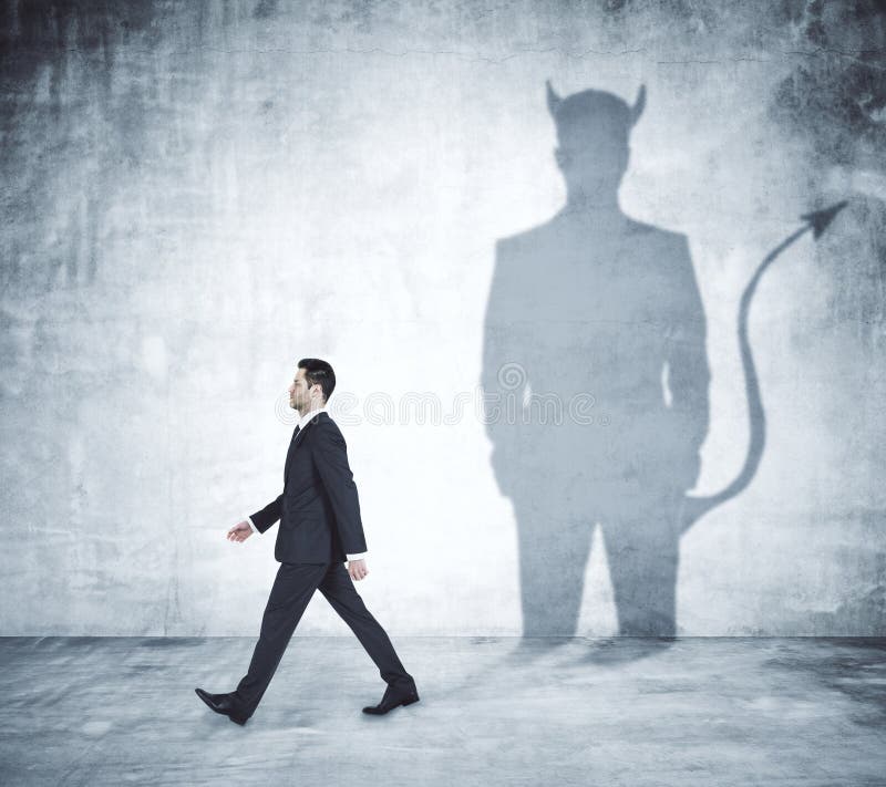 Walking man with devil shadow