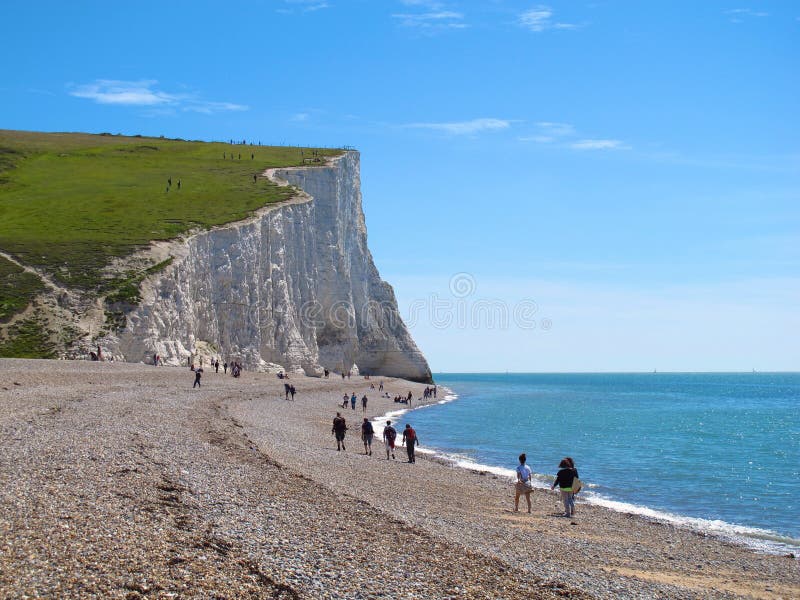 Walking on Pebble Beach Near White Cliffs of Seven Sisters, East Sussex ...