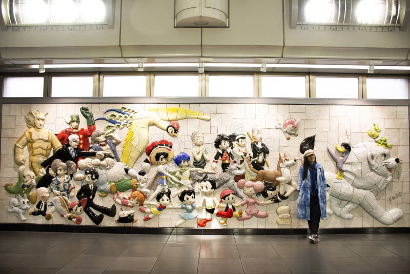 Wall art anime and hero japanese style in Ariake train JR railway Station at Koto in Tokyo, Japan