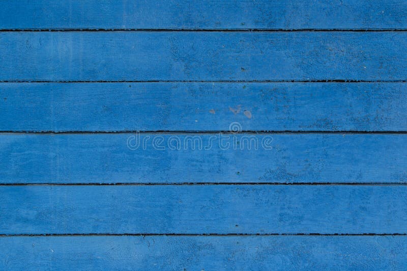 Wall from Boards Painted with a Dark Blue Paint. Stock Photo Image of