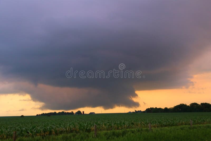 This is a cropped view of a wall cloud at the base of a rotating thunderstorm or also known as a mesocyclone. mesocyclones can produce tornados and are usually associated with severe weather.