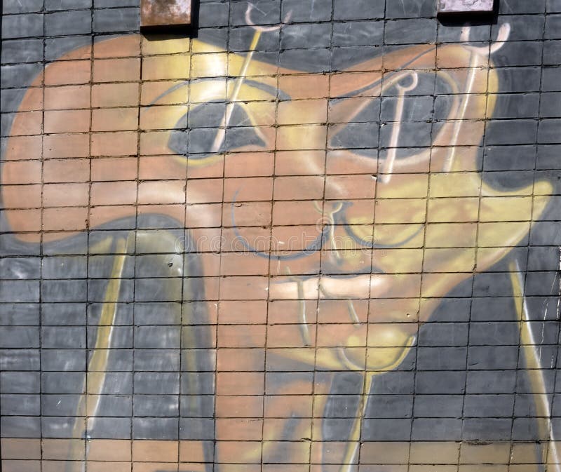 Wall is decorated with abstract drawings house paint closeup. Detail of a graffiti. Fragment for background. Modern iconic urban royalty free stock photography