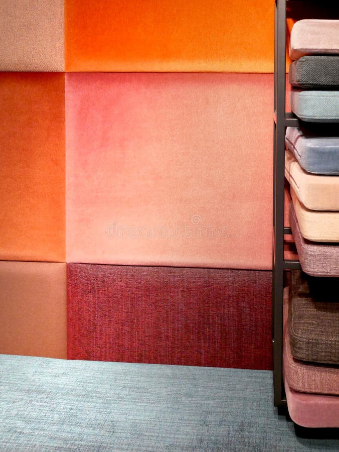 Wall with Decorative Fabric Panels and Velvet Cushions Stock Image