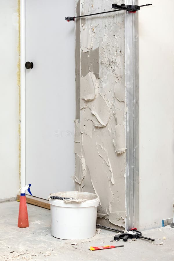 Wall with Fresh Plaster on it. Stock Photo Image of equipment, paint