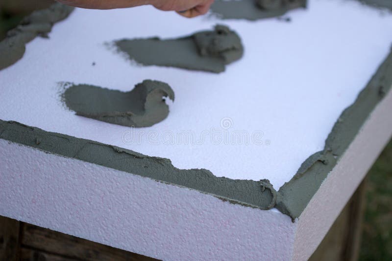 Wall Insulation with Polystyrene Panels, Glue Application and