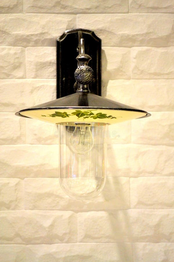 White wall light fixture stock image