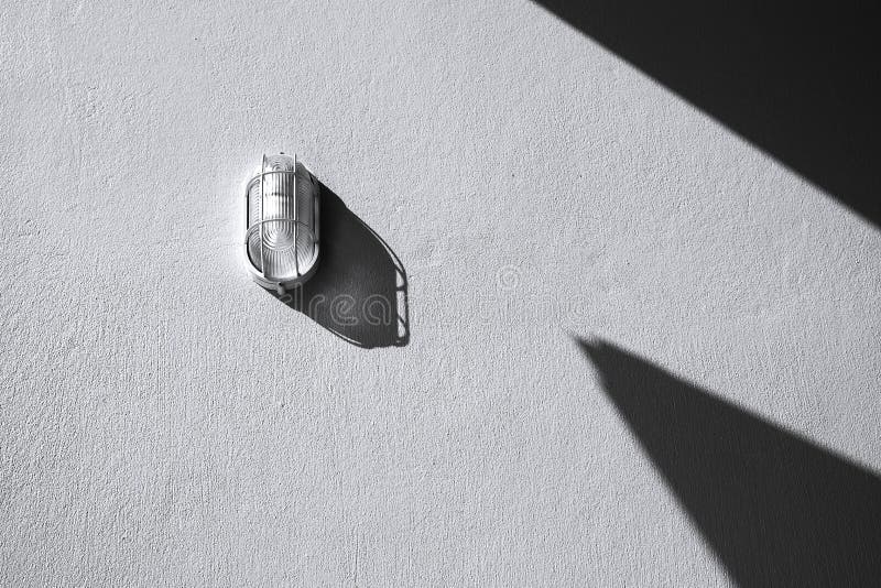 Wall light and shadow on concrete wall textured, abstract black