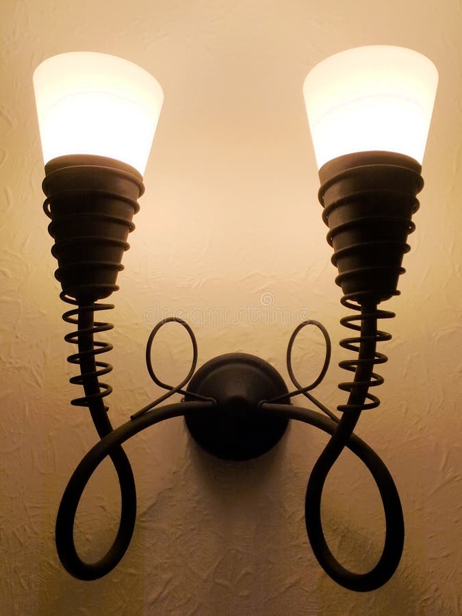 Wall Lights stock photo. Image of curly, wall, black 100349066