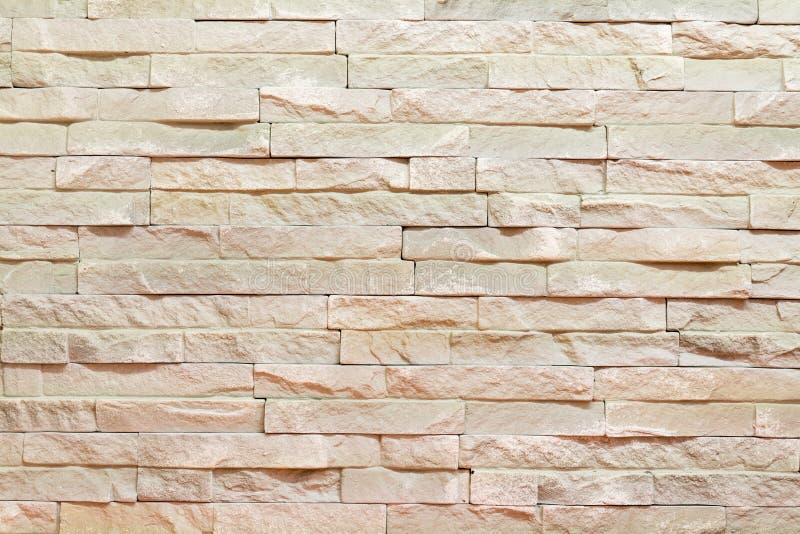 Wall made of decorative brown stone. Background stock images Wall made of decorative brown stone. Background stock images