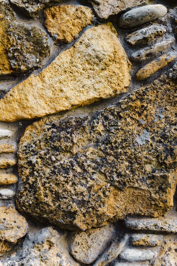 A Wall Made of Decorative Natural Stone As a Background or Texture