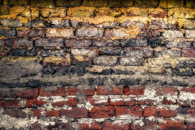 Wall made from a mix of unbaked clay and straw