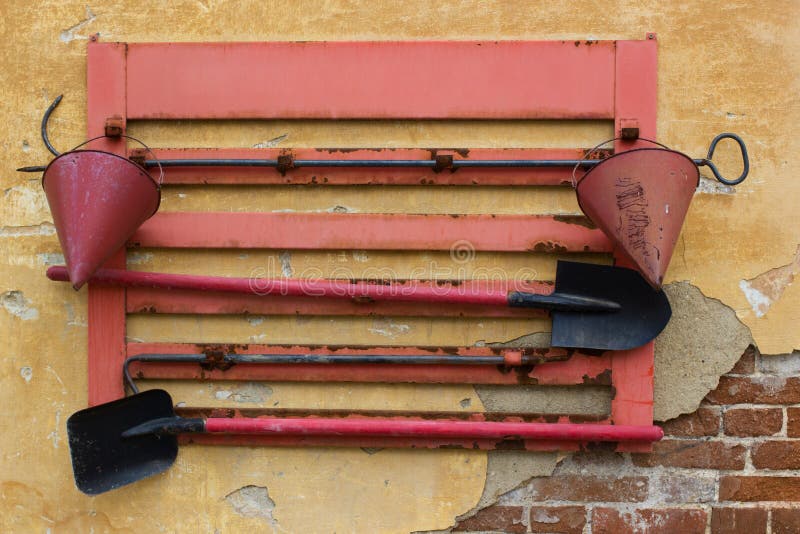 Wallmounted Fire Shield with Firefighting Tools. Shovel, Hook , Axe