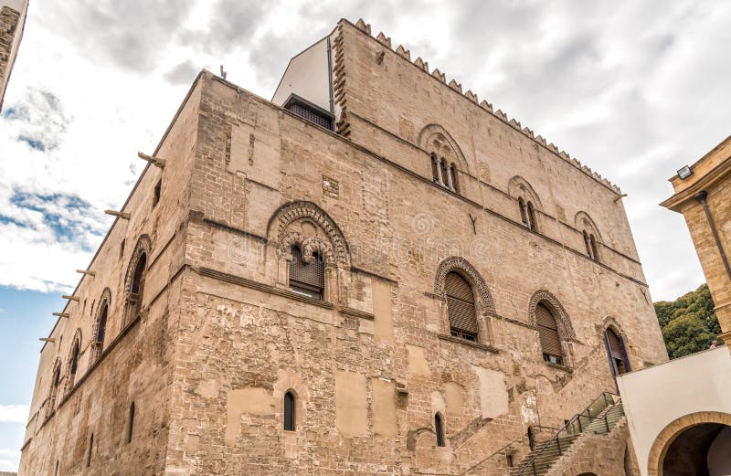 Wall with Mullioned windows with lava stone inlays of the Palace Steri Chiaramonte, Palermo, Sicily, Italy