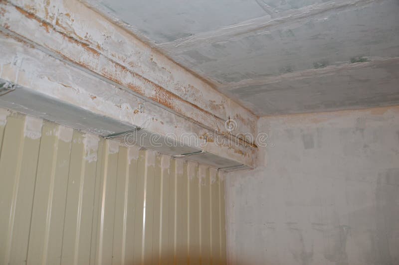 Wall Painting in the Interior with White Waterbased Paint Stock Photo