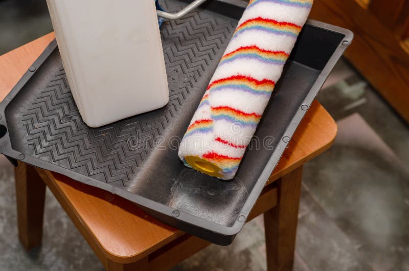 Wall Primer, Paint Tray, Variegated Paint Roller. Painting Tools Stock