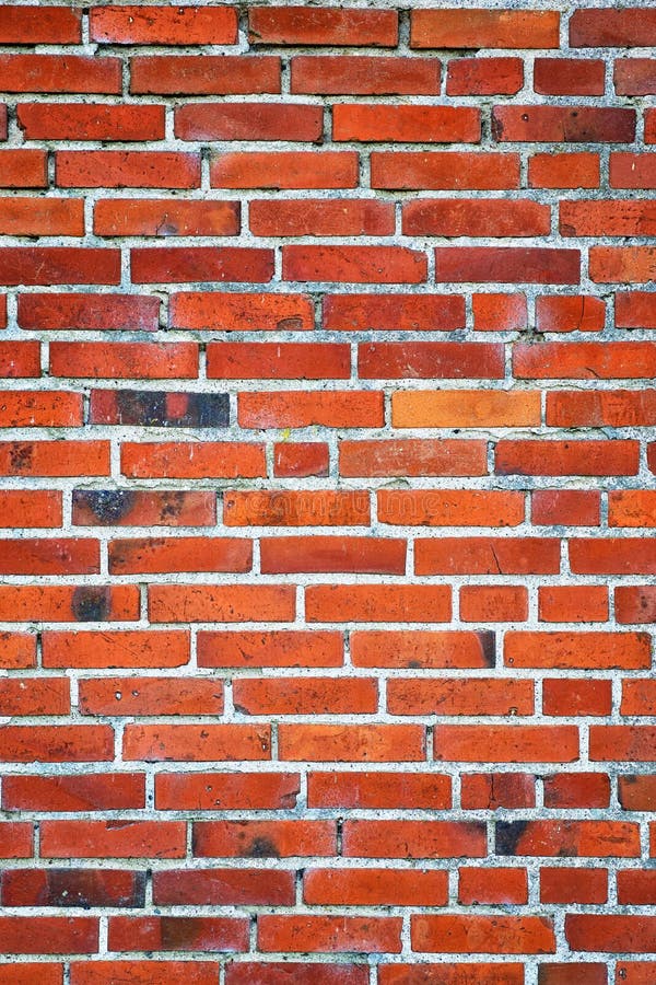 Wall of red bricks as a background