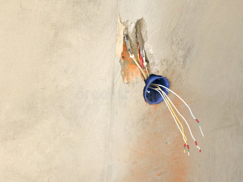 Wall socket installation.Work on installing electrical outlets. Electrician prepares the wiring fitting outlets. stock photos Wall socket installation.Work on installing electrical outlets. Electrician prepares the wiring fitting outlets. stock photos