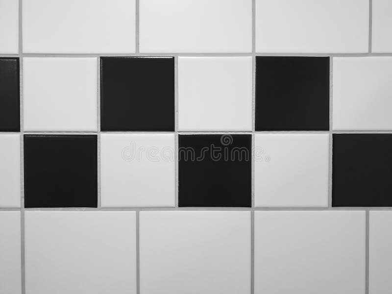 Wall Tiles in Black and White Separated with Joints. Stock Photo