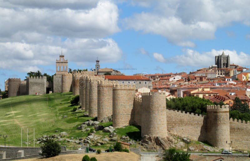 Wall, tower and bastion of Avila, Spain, made of yellow stone bricks