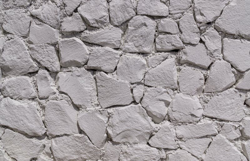 Wall of white stones stock image. Image of background - 152871265