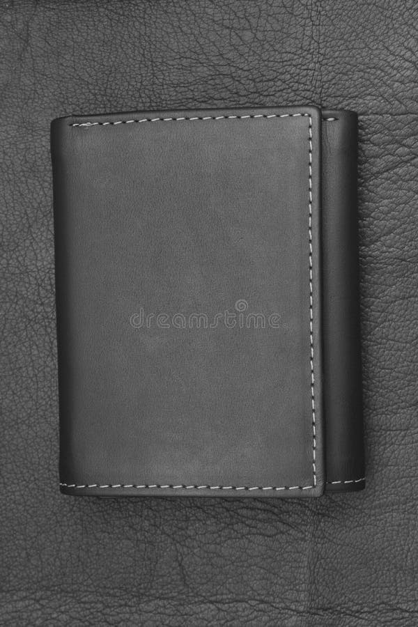 Wallet from Black Genuine Leather Against the Background of Structure ...